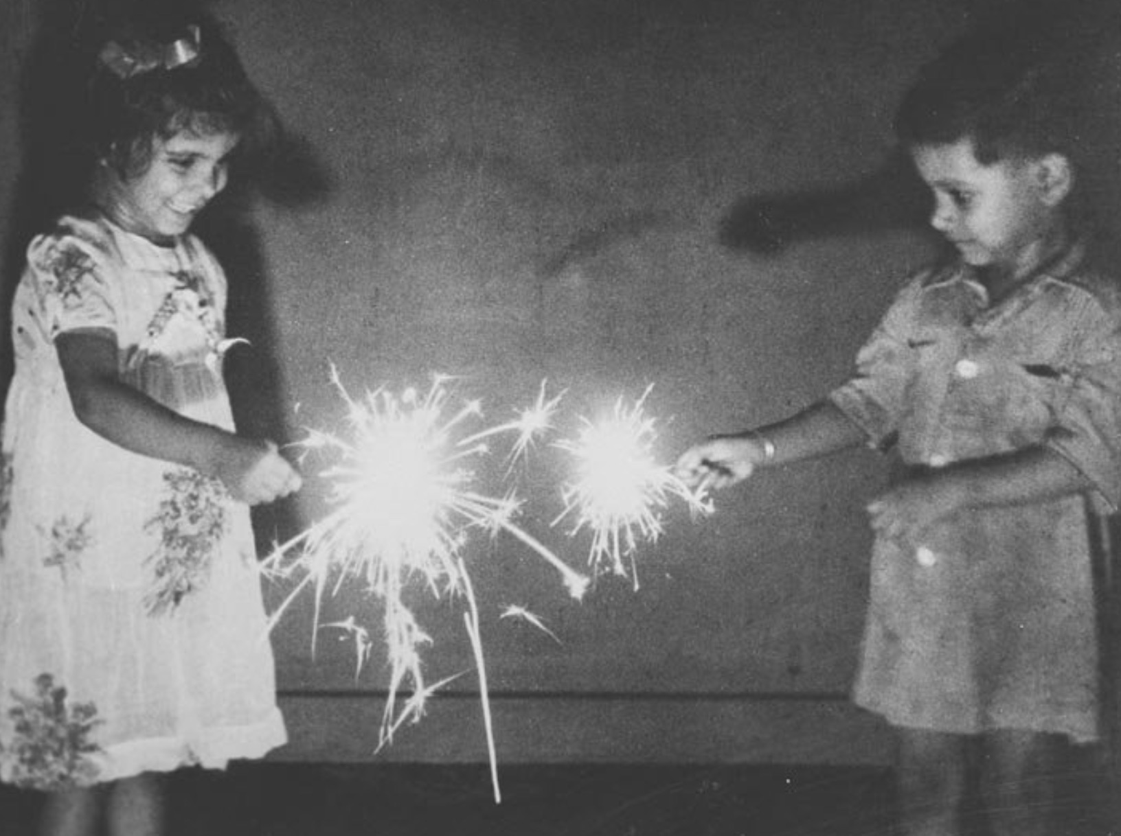 Kids with sparklers during Cracker Night in Penrith, England 